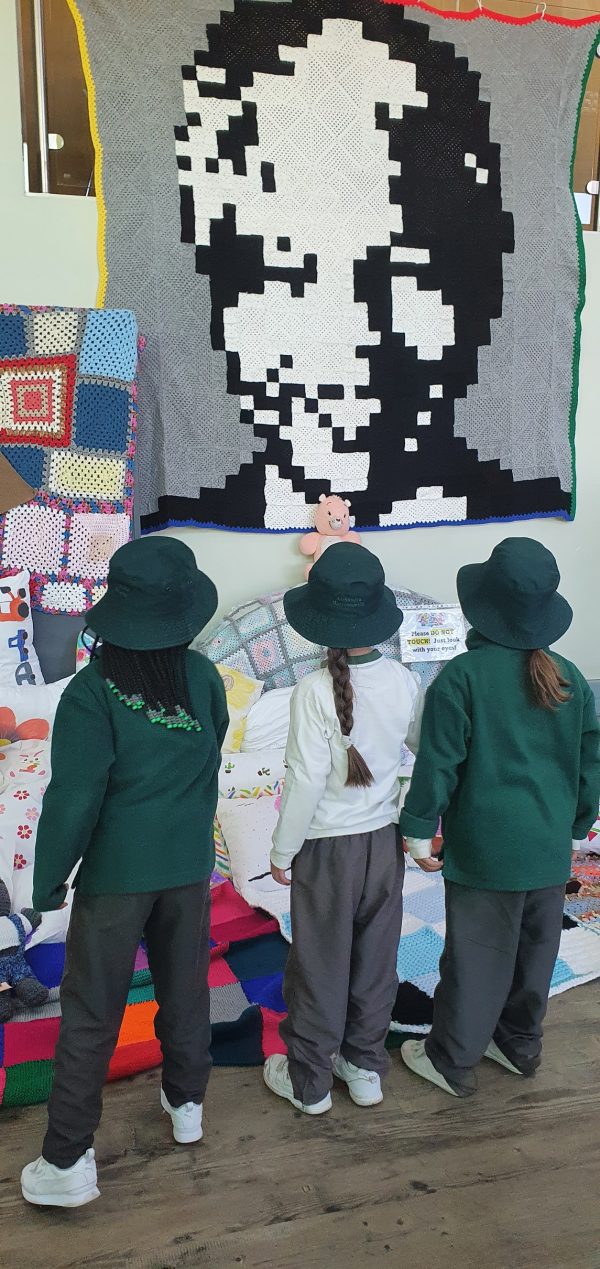 Grade Rs admiring the knitted creations
